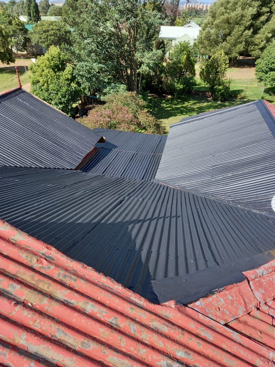 Supa rubber in action covering the roof of a house